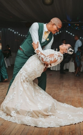 happy couple dancing at their wedding